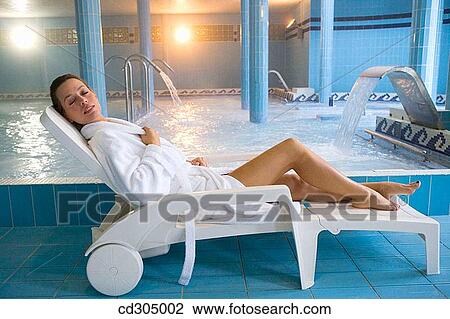 Therapeutic seawater pool (33? C) with hydrojet, underwater massage jets, waterfalls, bubbles, shoulder and neck massage waterfalls, jacuzzis, against-the-current swimming, and hot and cold plunge pools View Large Photo Image Stock Image - Therapeutic seawater pool (33? C) with hydrojet, underwater massage jets, waterfalls, bubbles, shoulder and neck massage waterfalls, jacuzzis, against-the-current swimming, and hot and cold plunge pools. Fotosearch
