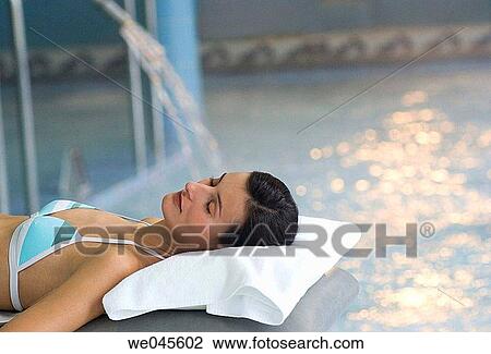 Therapeutic seawater pool (33? C) with hydrojet, underwater massage jets, waterfalls, bubbles, shoulder and neck massage waterfalls, jacuzzis, against-the-current swimming, and hot and cold plunge pools View Large Photo Image Stock Image - Therapeutic seawater pool (33? C) with hydrojet, underwater massage jets, waterfalls, bubbles, shoulder and neck massage waterfalls, jacuzzis, against-the-current swimming, and hot and cold plunge pools. Fotosearch