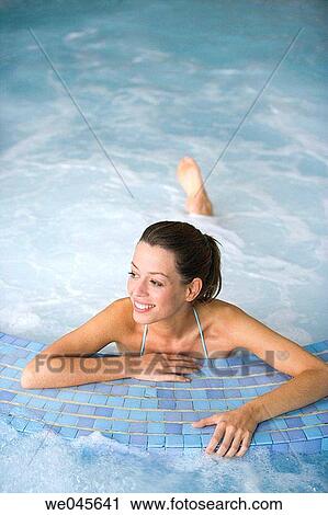 Therapeutic seawater pool (33? C) with hydrojet, underwater massage jets, waterfalls, bubbles, shoulder and neck massage waterfalls, jacuzzis, against-the-current swimming, and hot and cold plunge pools View Large Photo Image Stock Image - Therapeutic seawater pool (33? C) with hydrojet, underwater massage jets, waterfalls, bubbles, shoulder and neck massage waterfalls, jacuzzis, against-the-current swimming, and hot and cold plunge pools. Fotosearch