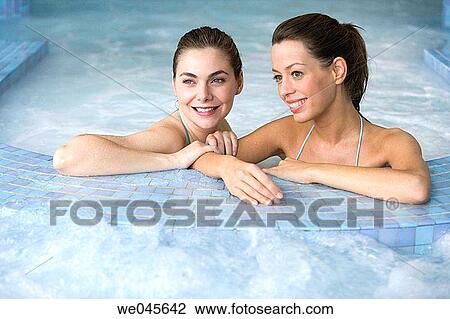 Therapeutic seawater pool (33? C) with hydrojet, underwater massage jets, waterfalls, bubbles, shoulder and neck massage waterfalls, jacuzzis, against-the-current swimming, and hot and cold plunge pools View Large Photo Image Stock Image - Therapeutic seawater pool (33? C) with hydrojet, underwater massage jets, waterfalls, bubbles, shoulder and neck massage waterfalls, jacuzzis, against-the-current swimming, and hot and cold plunge pools. Fotosearch
