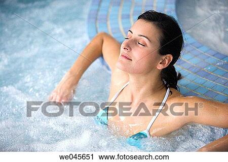 Therapeutic seawater pool (33? C) with hydrojet, underwater massage jets, waterfalls, bubbles, shoulder and neck massage waterfalls, jacuzzis, against-the-current swimming, and hot and cold plunge pools View Large Photo Image Stock Image - Therapeutic seawater pool (33? C) with hydrojet, underwater massage jets, waterfalls, bubbles, shoulder and neck massage waterfalls, jacuzzis, against-the-current swimming, and hot and cold plunge pools. Fotosearch