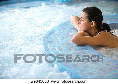 Therapeutic seawater pool (33? C) with hydrojet, underwater massage jets, waterfalls, bubbles, shoulder and neck massage waterfalls, jacuzzis, against-the-current swimming, and hot and cold plunge pools View Large Photo Image Stock Image - Therapeutic seawater pool (33? C) with hydrojet, underwater massage jets, waterfalls, bubbles, shoulder and neck massage waterfalls, jacuzzis, against-the-current swimming, and hot and cold plunge pools. Fotosearch
