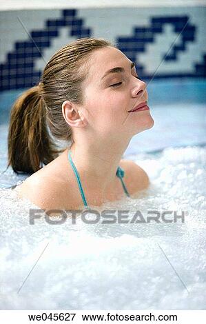 Therapeutic seawater pool (33? C) with hydrojet, underwater massage jets, waterfalls, bubbles, shoulder and neck massage waterfalls, jacuzzis, against-the-current swimming, and hot and cold plunge pools View Large Photo Image Stock Photo - Therapeutic seawater pool (33? C) with hydrojet, underwater massage jets, waterfalls, bubbles, shoulder and neck massage waterfalls, jacuzzis, against-the-current swimming, and hot and cold plunge pools. Fotosearch
