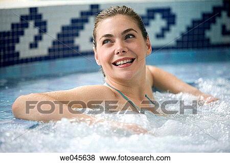 Therapeutic seawater pool (33? C) with hydrojet, underwater massage jets, waterfalls, bubbles, shoulder and neck massage waterfalls, jacuzzis, against-the-current swimming, and hot and cold plunge pools View Large Photo Image Stock Photo - Therapeutic seawater pool (33? C) with hydrojet, underwater massage jets, waterfalls, bubbles, shoulder and neck massage waterfalls, jacuzzis, against-the-current swimming, and hot and cold plunge pools. Fotosearch