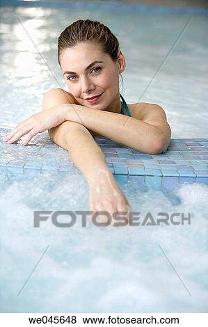 Therapeutic seawater pool (33? C) with hydrojet, underwater massage jets, waterfalls, bubbles, shoulder and neck massage waterfalls, jacuzzis, against-the-current swimming, and hot and cold plunge pools View Large Photo Image Stock Photo - Therapeutic seawater pool (33? C) with hydrojet, underwater massage jets, waterfalls, bubbles, shoulder and neck massage waterfalls, jacuzzis, against-the-current swimming, and hot and cold plunge pools. Fotosearch