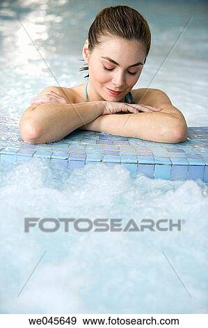 Therapeutic seawater pool (33? C) with hydrojet, underwater massage jets, waterfalls, bubbles, shoulder and neck massage waterfalls, jacuzzis, against-the-current swimming, and hot and cold plunge pools View Large Photo Image Stock Photo - Therapeutic seawater pool (33? C) with hydrojet, underwater massage jets, waterfalls, bubbles, shoulder and neck massage waterfalls, jacuzzis, against-the-current swimming, and hot and cold plunge pools. Fotosearch