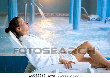 Therapeutic seawater pool (33? C) with hydrojet, underwater massage jets, waterfalls, bubbles, shoulder and neck massage waterfalls, jacuzzis, against-the-current swimming, and hot and cold plunge pools View Large Photo Image Stock Photography - Therapeutic seawater pool (33? C) with hydrojet, underwater massage jets, waterfalls, bubbles, shoulder and neck massage waterfalls, jacuzzis, against-the-current swimming, and hot and cold plunge pools. Fotosearch