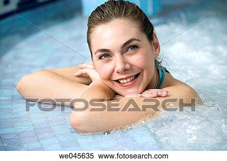 Therapeutic seawater pool (33? C) with hydrojet, underwater massage jets, waterfalls, bubbles, shoulder and neck massage waterfalls, jacuzzis, against-the-current swimming, and hot and cold plunge pools View Large Photo Image Stock Photography - Therapeutic seawater pool (33? C) with hydrojet, underwater massage jets, waterfalls, bubbles, shoulder and neck massage waterfalls, jacuzzis, against-the-current swimming, and hot and cold plunge pools. Fotosearch