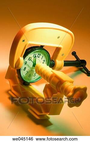 Toy clamps and clock View Large Photo Image Stock Photograph - Toy clamps and clock. Fotosearch