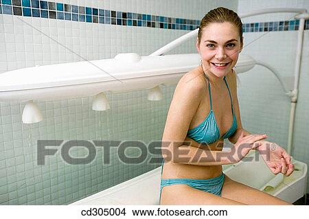 Vichy Shower. Relaxing sea water shower to ease muscle tension View Large Photo Image Picture - Vichy Shower. Relaxing sea water shower to ease muscle tension. Fotosearch
