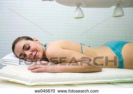 Vichy Shower. Relaxing sea water shower to ease muscle tension View Large Photo Image Stock Image - Vichy Shower. Relaxing sea water shower to ease muscle tension. Fotosearch