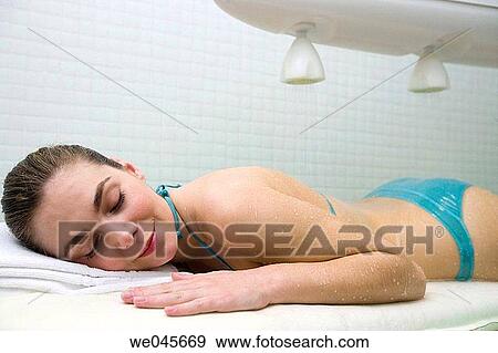 Vichy Shower. Relaxing sea water shower to ease muscle tension View Large Photo Image Stock Photo - Vichy Shower. Relaxing sea water shower to ease muscle tension. Fotosearch