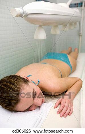 Vichy Shower. Relaxing sea water shower to ease muscle tension View Large Photo Image Stock Photograph - Vichy Shower. Relaxing sea water shower to ease muscle tension. Fotosearch