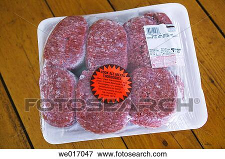 Stock Photo - Warning label on raw beef. Fotosearch