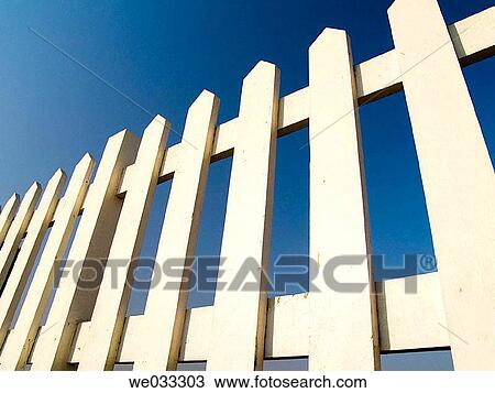 White fence on blue sky. View Large Photo Image Stock Image - White fence on blue sky.. Fotosearch