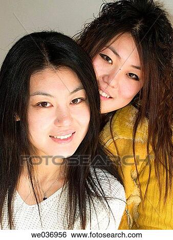 Stock Photograph - 20 to 30s, asian, beautiful, girls, sister.. Fotosearch