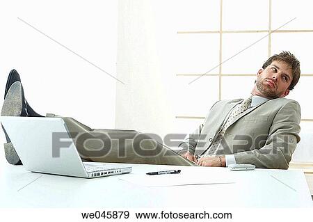 Stock Photo - 30's, absorbed, absent-mindedness, Absent-minded, 20's. Fotosearch
