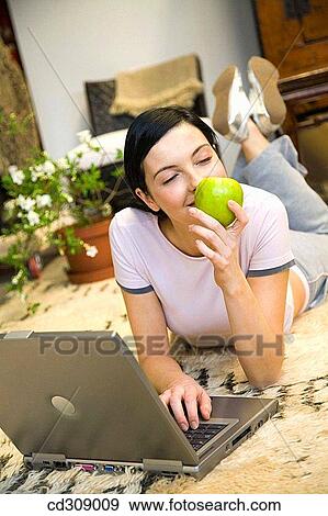 30's, at-home, apple, 20's View Large Photo Image Stock Photo - 30's, at-home, apple, 20's. Fotosearch