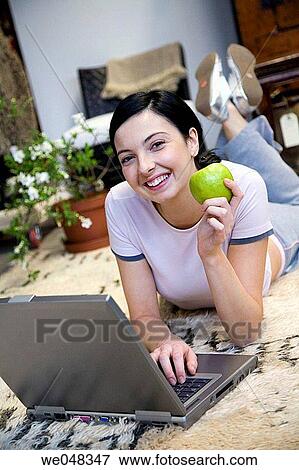 30's, at-home, apple, 20's View Large Photo Image Stock Photo - 30's, at-home, apple, 20's. Fotosearch