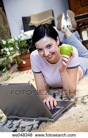 30's, at-home, apple, 20's View Large Photo Image Stock Photo - 30's, at-home, apple, 20's. Fotosearch