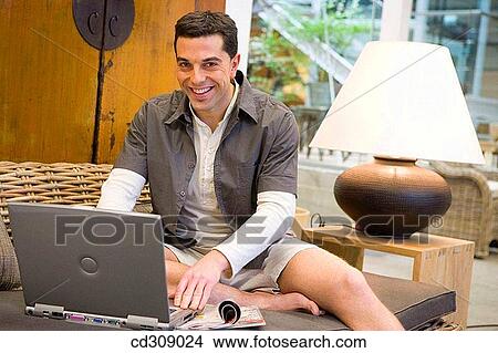 30's, barefoot, at-home, 20's View Large Photo Image Picture - 30's, barefoot, at-home, 20's. Fotosearch