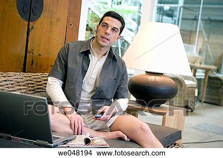 30's, barefoot, at-home, 20's View Large Photo Image Picture - 30's, barefoot, at-home, 20's. Fotosearch