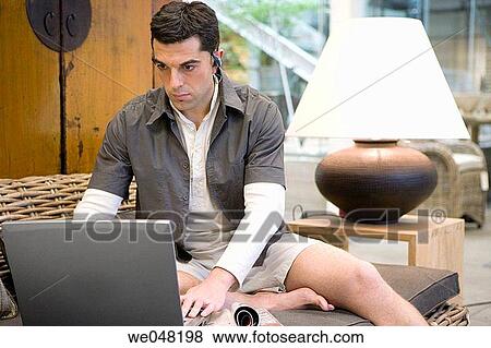 30's, barefoot, at-home, 20's View Large Photo Image Stock Photo - 30's, barefoot, at-home, 20's. Fotosearch