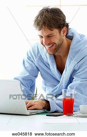 Stock Photo - 30's, beard, bathrobe, 20's. Fotosearch
