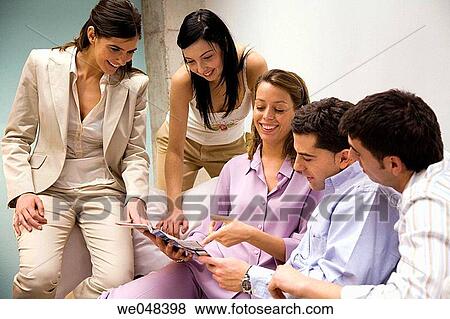 Stock Photo - 30's, browsing, browse, at-home, 20's. Fotosearch