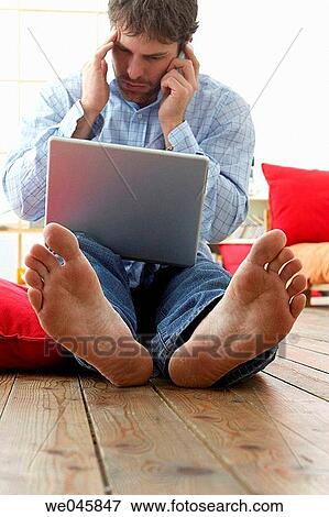 30's, calling, barefoot, at-home, 20's View Large Photo Image Stock Photo - 30's, calling, barefoot, at-home, 20's. Fotosearch