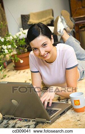 Stock Image - 30's, calm, at-home, 20's. Fotosearch