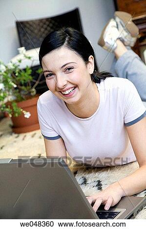 Stock Image - 30's, calm, at-home, 20's. Fotosearch