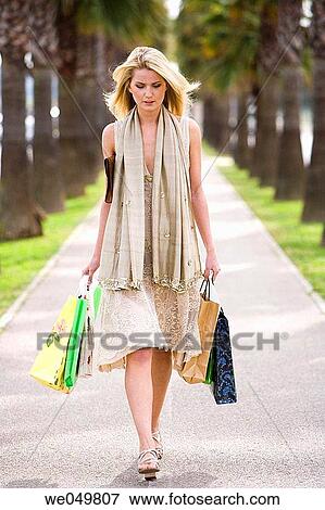30's, carrying, carry, bag, 20's View Large Photo Image Stock Photo - 30's, carrying, carry, bag, 20's. Fotosearch