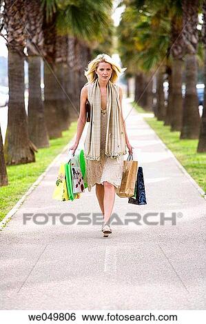 30's, carrying, carry, bag, 20's View Large Photo Image Stock Photograph - 30's, carrying, carry, bag, 20's. Fotosearch