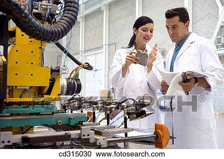 a, Gipuzkoa, Basque Country. Advanced industrial robotic system, final assembly of the motor drive. View Large Photo Image Stock Image - a, Gipuzkoa, Basque Country. Advanced industrial robotic system, final assembly of the motor drive.. Fotosearch
