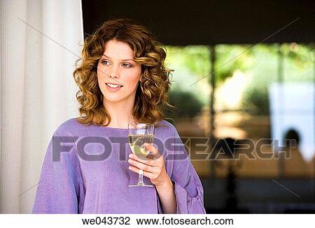 Stock Image - absorbed, Alcoholic drink, alcohol, 20's. Fotosearch