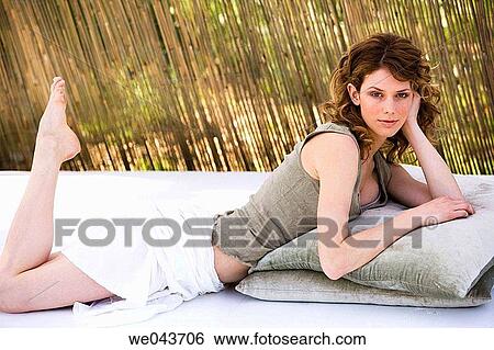 absorbed, calm, barefoot, 20's View Large Photo Image Stock Photograph - absorbed, calm, barefoot, 20's. Fotosearch