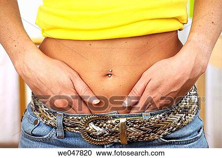 Stock Image - ache, belt, belly, aching, abdomen. Fotosearch