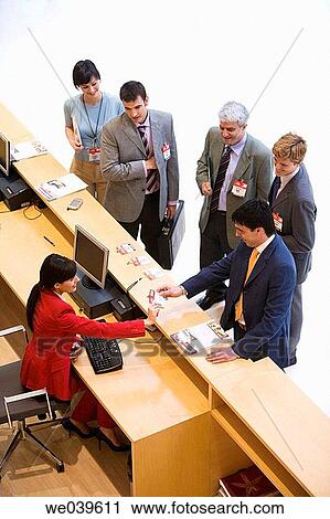 Admission desk, business, briefcase, accreditation View Large Photo Image Stock Image - Admission desk, business, briefcase, accreditation. Fotosearch