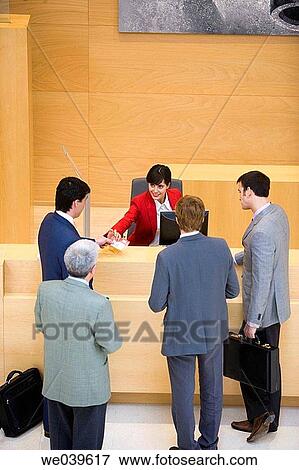 Admission desk, businessman, business, briefcase, accreditation View Large Photo Image Stock Photo - Admission desk, businessman, business, briefcase, accreditation. Fotosearch