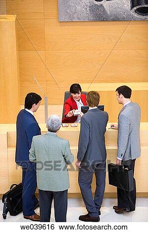 Admission desk, businessman, business, briefcase, accreditation View Large Photo Image Stock Photograph - Admission desk, businessman, business, briefcase, accreditation. Fotosearch