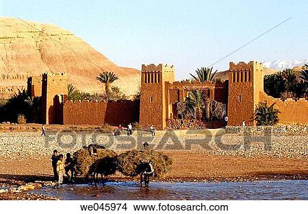 Adobe fortress of Ait Benhaddou and oued (river) after spring rainfalls. South Atlas. Morocco View Large Photo Image Picture - Adobe fortress of Ait Benhaddou and oued (river) after spring rainfalls. South Atlas. Morocco. Fotosearch