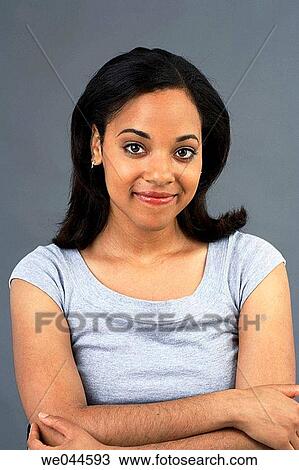 African American woman smiling into camera View Large Photo Image Stock Image - African American woman smiling into camera. Fotosearch