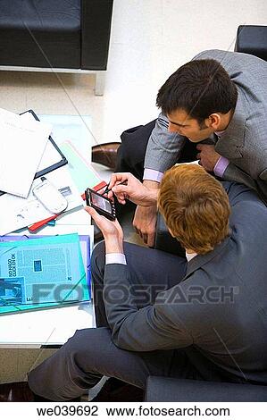 Stock Image - agenda, businesspeople, businessman, business, 30's. Fotosearch