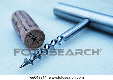 Stock Image - Alcoholic drink, corkscrew, cork, Close-up, alcohol. Fotosearch