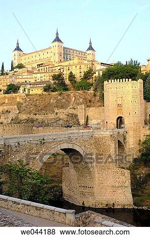 Alcßntara Bridge on Tagus river with the Alcßzar in background. Toledo. Spain View Large Photo Image Stock Photo - Alcßntara Bridge on Tagus river with the Alcßzar in background. Toledo. Spain. Fotosearch