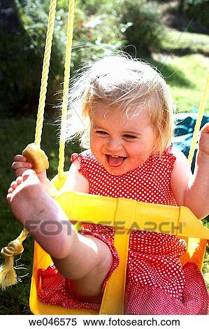 amusement, carefree, barefoot, baby, activity View Large Photo Image Stock Photography - amusement, carefree, barefoot, baby, activity. Fotosearch