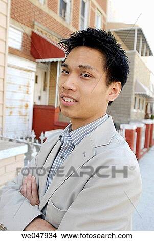 arms folded, at-home, Asian-American, Asian, Arms crossed View Large Photo Image Picture - arms folded, at-home, Asian-American, Asian, Arms crossed. Fotosearch