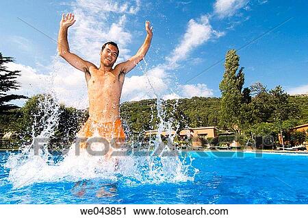 Arms raised, black hair, bathing, bathe, amusement View Large Photo Image Stock Image - Arms raised, black hair, bathing, bathe, amusement. Fotosearch