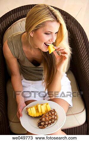 at-home, blond, biting, bite, armchair View Large Photo Image Stock Image - at-home, blond, biting, bite, armchair. Fotosearch